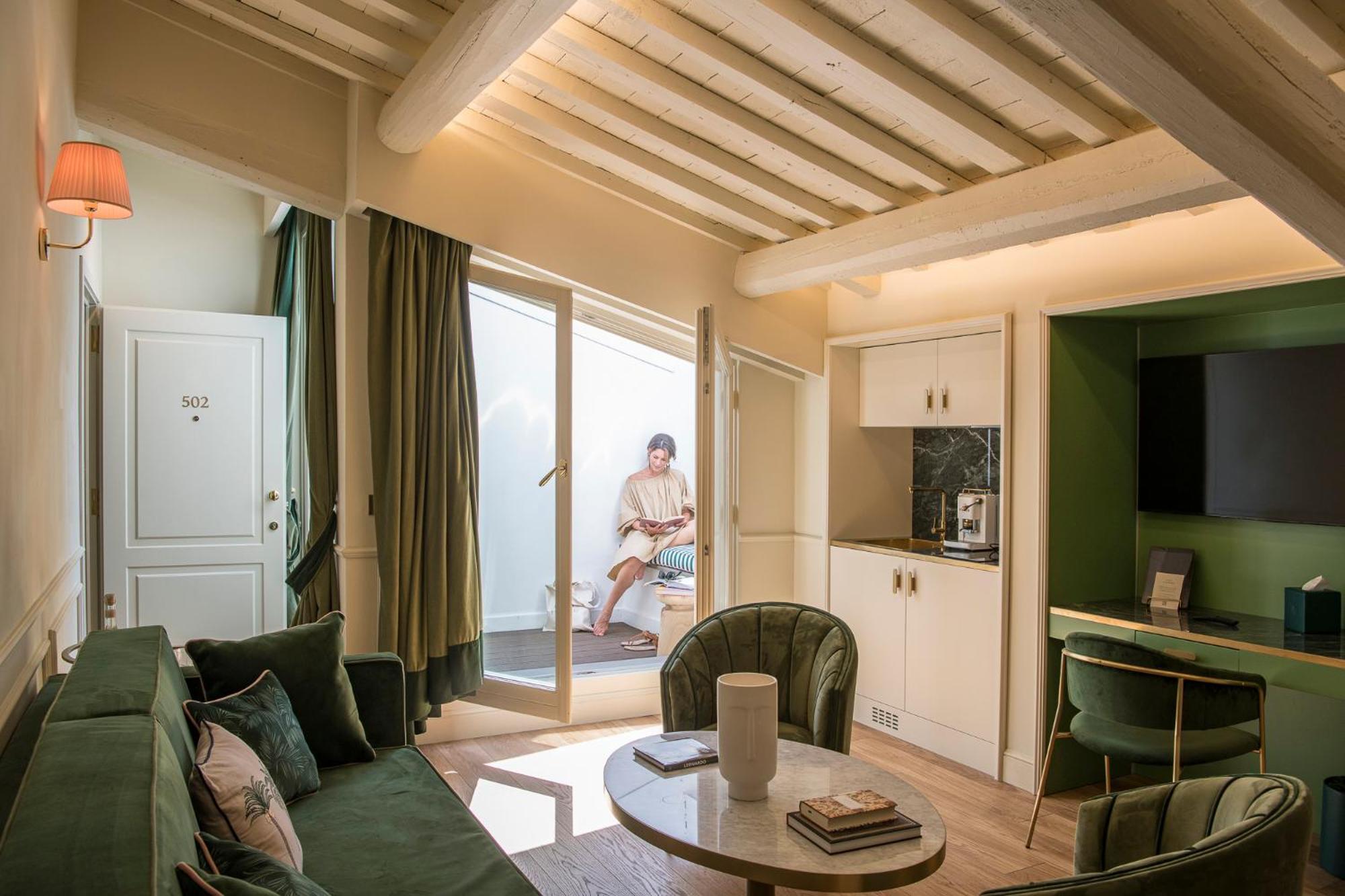Hotel La Gemma Florenz Exterior foto A suite at the hotel